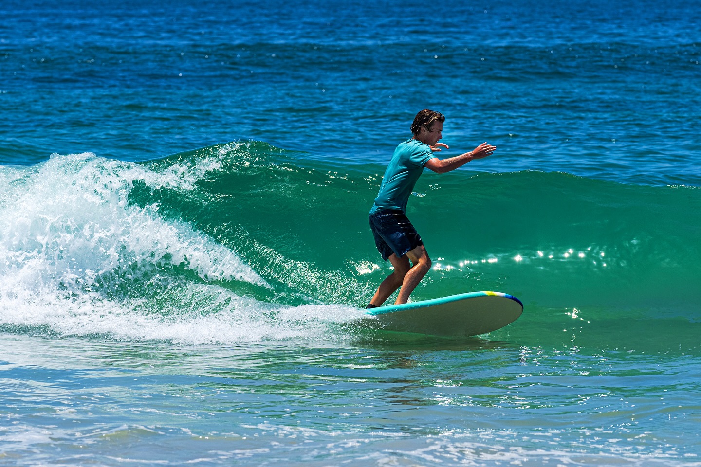Wavestorm 8ft Classic soft top surfboard in blue/green colorway